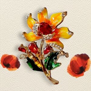 Elegant Floral Brooch with Red and Yellow Accents